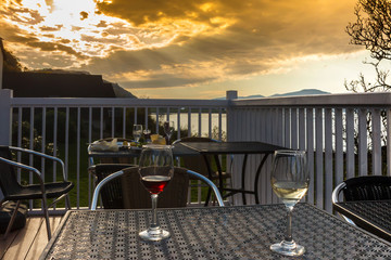 Drinking wine during beautiful sunset at Loch Linnhe in Kentallen. Argyll and Bute, Scotland, United Kingdom