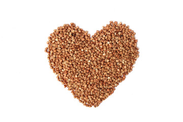 raw buckwheat isolated on white.