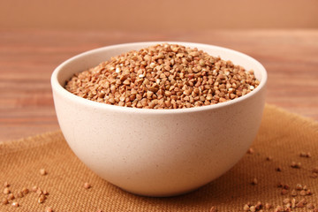 raw buckwheat on a colored background.