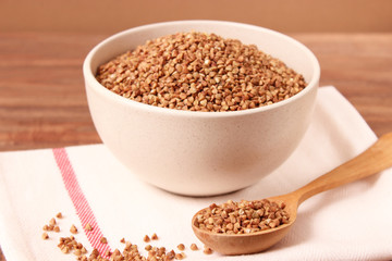 raw buckwheat on a colored background.