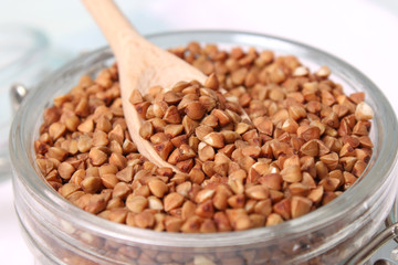 raw buckwheat on a colored background.