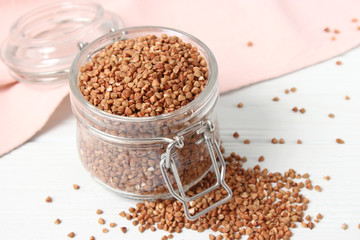 raw buckwheat on a colored background.