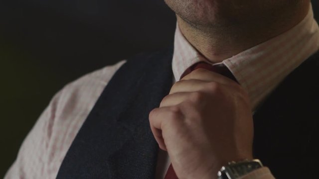 Man businessman wears a suit