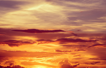 Sunset dramatic orange clouds sky background