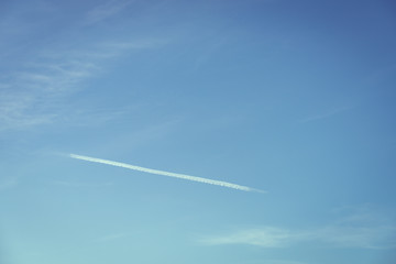 Fototapeta na wymiar Bright blue sky and white clouds background