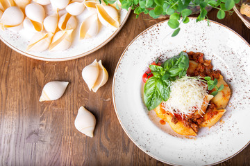 Shell pasta with  bolognese sauce. Top view.