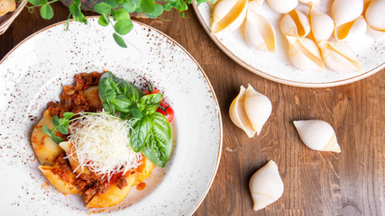 Shell pasta with  bolognese sauce.  Tasty Italian pasta. Top view