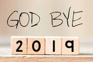 close up view of wooden blocks and goodbye 2019 lettering