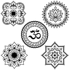 Set of circular patterns in form of Mandala with religious symbols. Oriental signs OM, lotus flower, sun for Henna, Mehndi, tattoo, decoration. Decorative ornament in ethnic style.