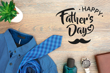 Flat lay with men's accessories and happy father's day greeting lettering text