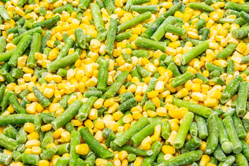 Obraz na płótnie Canvas Frozen organic sweet corn and green beans.