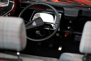 Obraz na płótnie Canvas The interior of a classic car.