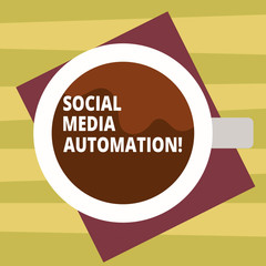 Text sign showing Social Media Automation. Conceptual photo Automation of posting content to social media Top View of Drinking Cup Filled with Beverage on Color Paper photo