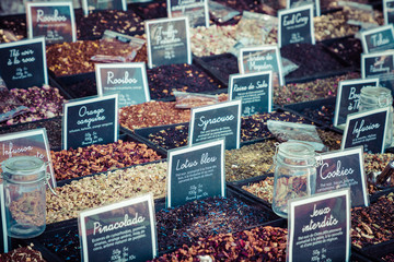 French colorful herb and spices at street market in the village in Provence, France.