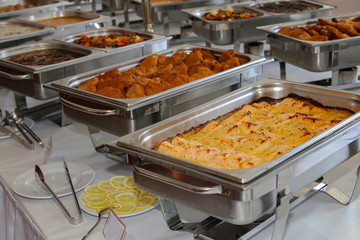 closeup of chafing dishes at a party