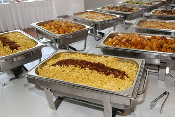 closeup of chafing dishes at a party