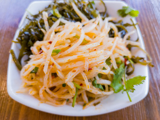 Close up shot of seaweed and potato slice