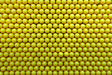 Abstract dots background in yellow colors.