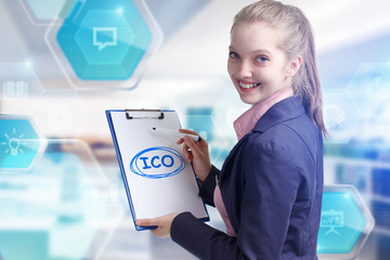 Business, technology, internet and networking concept. Young entrepreneur showing keyword: ICO