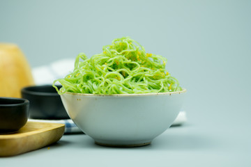 Selective focus of Jade green noodles