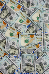 US dollars in one hundred banknotes, cash texture.