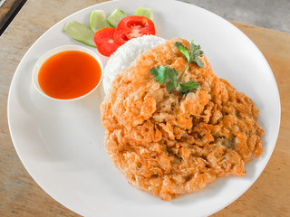 Thai style pork omelette with rice and chili sauce