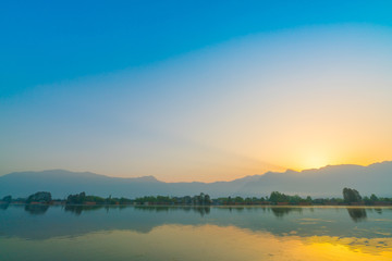 Fototapeta na wymiar Sunrise on Dal lake, Kashmir India .
