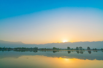 Sunrise on Dal lake, Kashmir India .