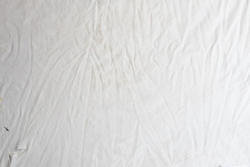 close up of background texture old white dirty T-shirt