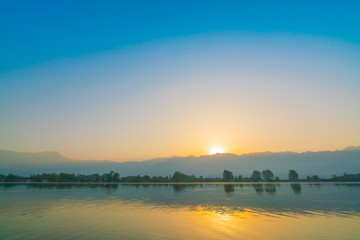 Sunrise on Dal lake, Kashmir India .