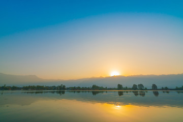 Sunrise on Dal lake, Kashmir India .