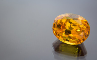 Natural yellow Sapphire gemstone, beautiful yellow gold citrin gemstone isolated on white background, as jewelry background