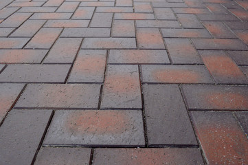 Pavement tiles textured brown close up