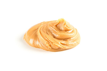 Creamy peanut butter isolated on white background. A traditional product of American cuisine