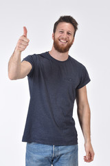 man thumps up on white background