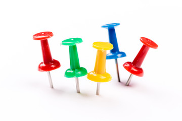 Push pins isolated on white background.