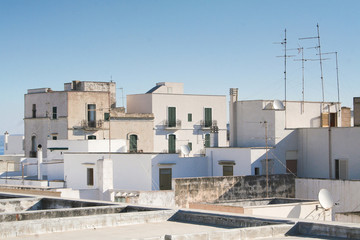 Fototapeta premium Traditional white roof-terrace building of Gallipoli, a village in Puglia, Italy