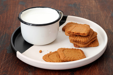 Homemade caramel cookies with a cup of milk