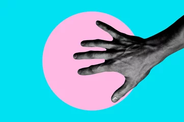 Isolated on blue background black and white man hand photo on pink circle. Surrealistic collage style, contemporary art element for design, posters and banners. Cotton candy pop colors. Magazine style © Katia
