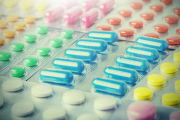 Medical pills a large number. Images for the pharmaceutical industry. The concept of medicine.