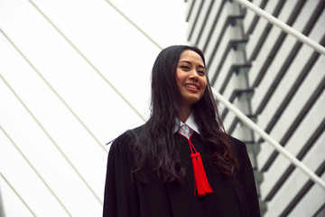 Beautiful Asia girl students are happy after graduation.