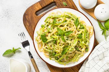Pasta spaghetti with zucchini top view.