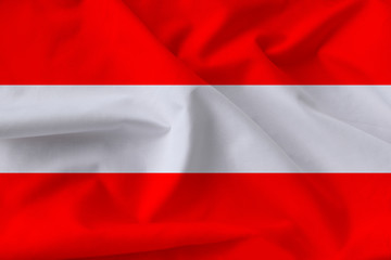 Beautiful silk flag of Austria with soft folds in the wind