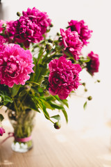 Elegant bouquet of a lot of peonies of pink color close up. Beautiful flower for any holiday. Lots of pretty and romantic flowers in floral shop. Bouquet of a lot of peonies of pink color close up.