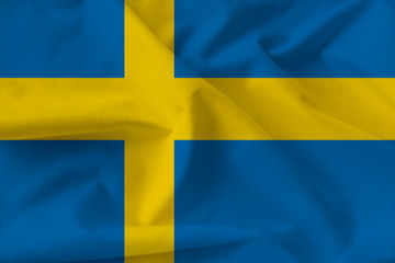 Beautiful silk flag of Sweden with soft folds in the wind
