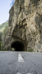 Road tunnel mountains. Durmitor park in montenegro. Dangerous road