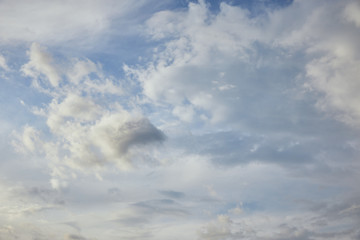 white clouds on calm blue sky background