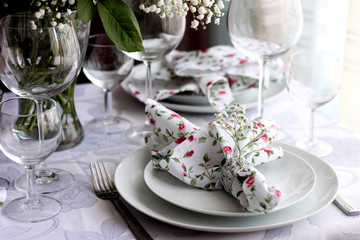 Beautiful holiday table setting with flowers
