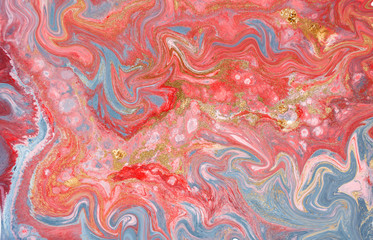Marble abstract acrylic background. Pink and blue marbling artwork texture. Agate ripple pattern. Gold powder.