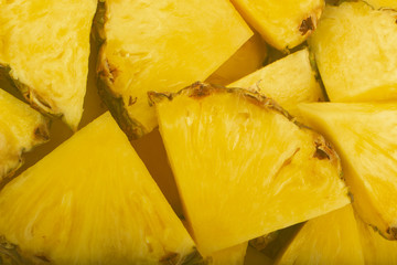 heap of slices of pineapple background